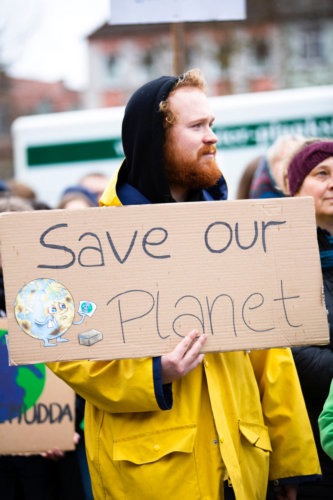 man protesting climate change